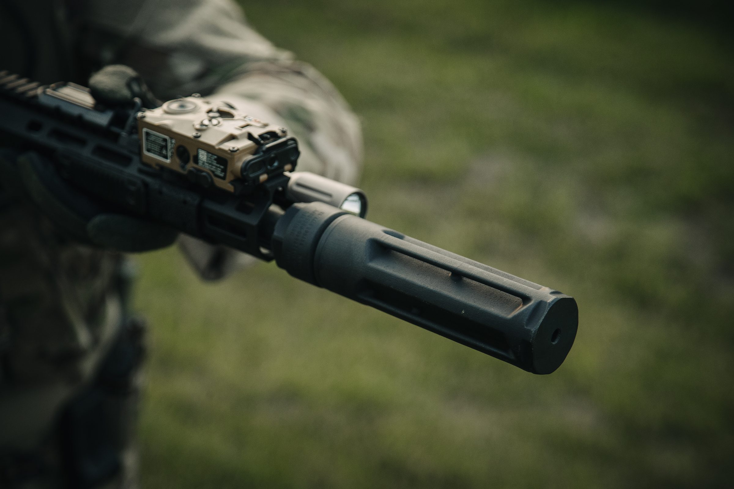 Veil suppressor mounted on a 5.56 rifle, side profile